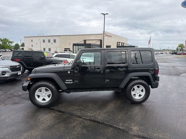 Used 2012 Jeep Wrangler Unlimited Sport with VIN 1C4BJWDG2CL148069 for sale in Kansas City